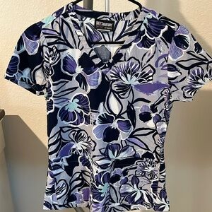 Blue and purple floral print scrub top